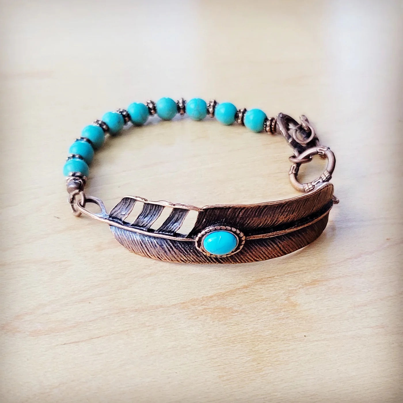 Round Turquoise Beaded Bracelet on Copper w Feather